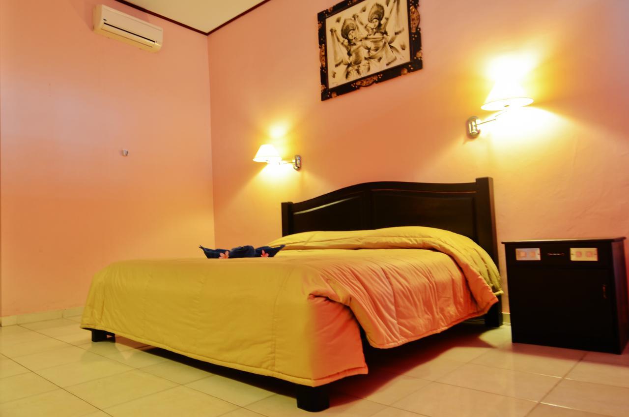 Pesona Beach Inn Кута Экстерьер фото