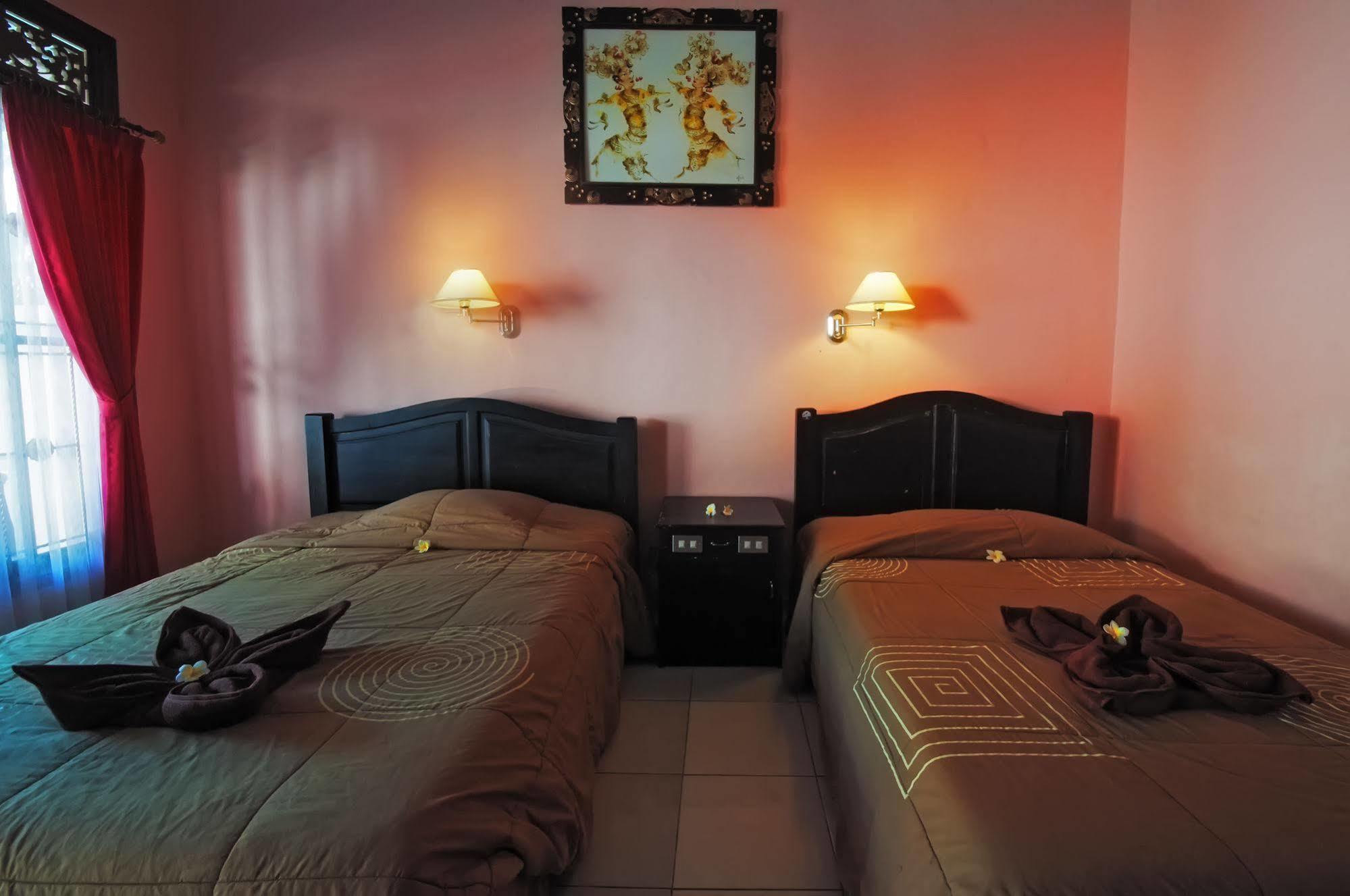 Pesona Beach Inn Кута Экстерьер фото