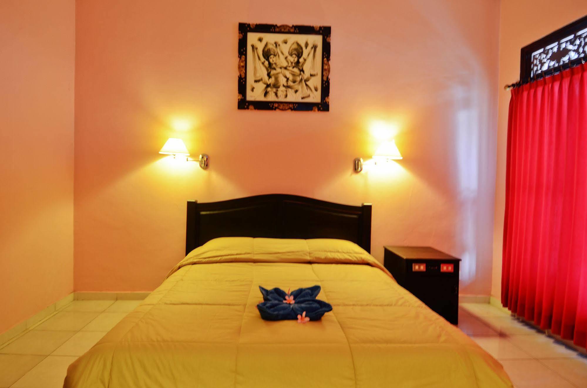 Pesona Beach Inn Кута Экстерьер фото