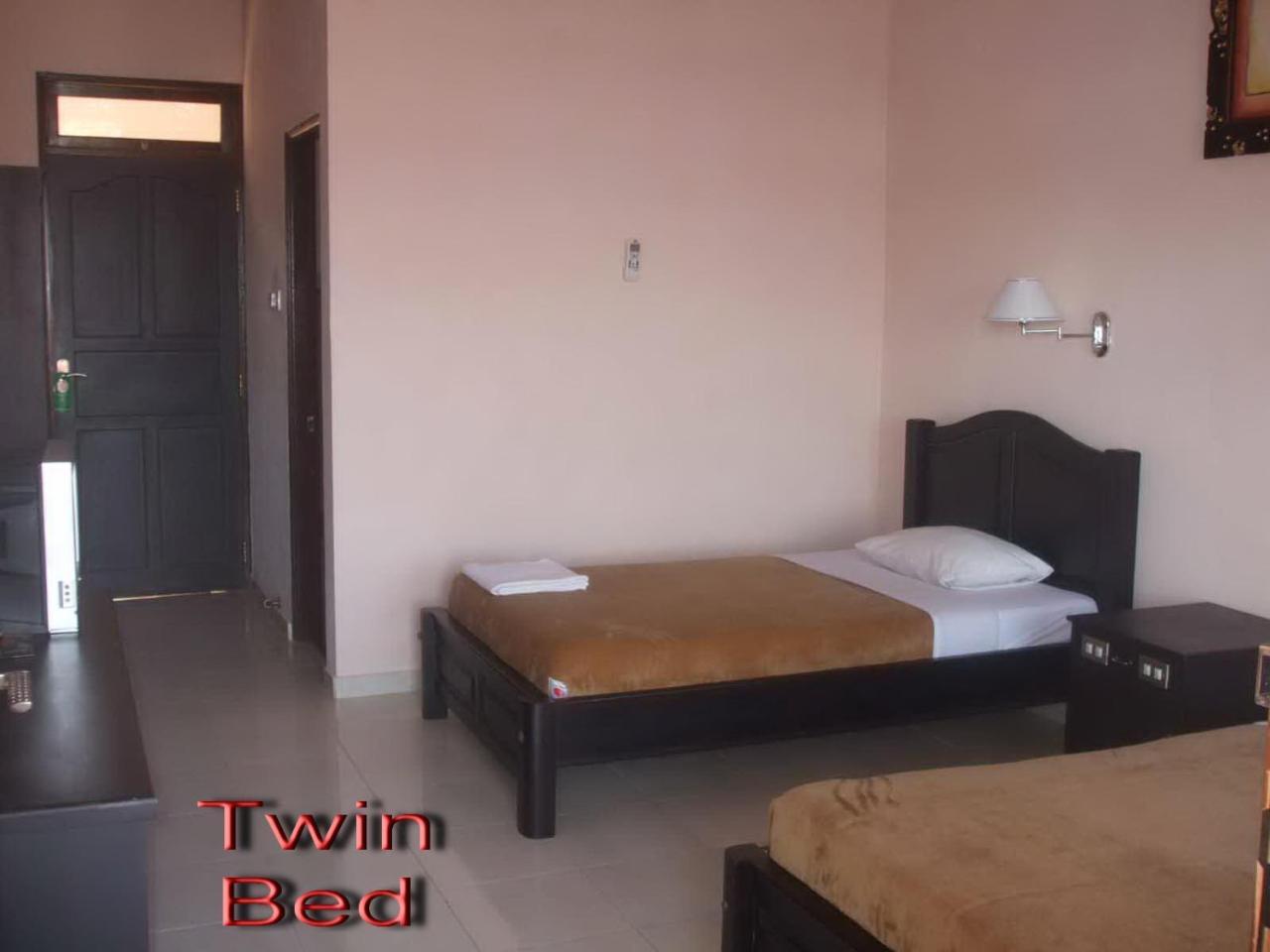 Pesona Beach Inn Кута Экстерьер фото